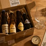 Achat biere en ligne : faux bons plans, carton belge et verre tulipe